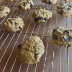 chocolate chip cookies lined on a cooling rack